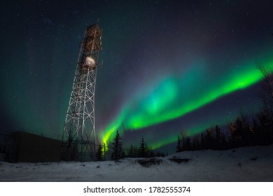 Aurora Borealis Streak Across Sky With Old Radio Tower 