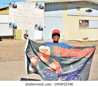 Aurora, CO, USA. Sep 2, 2019. Older African American Man Showing Support For President Trump At The Stand For ICE Rally In Aurora, Colorado While Holding Up His Flag And Support Sign. 