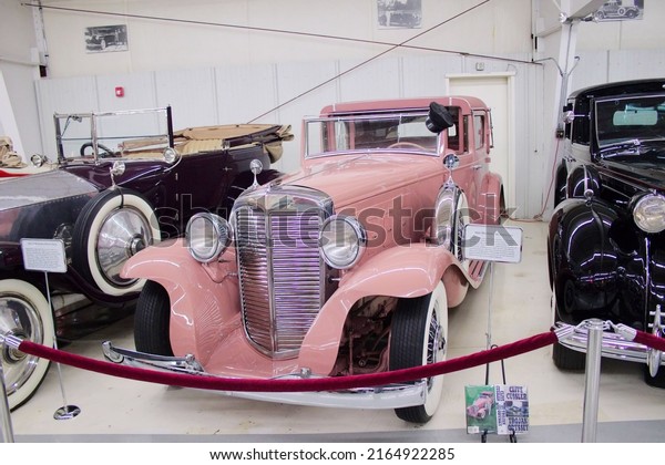 Aurora\
Colorado June 2 2022 Full view of vintage 1931 Marmon V16 Town Car.\
Author Clive Cussler museum of restored vehicles. Main character in\
his novels Dirk Pitt drove this in Trojan\
Odyssey.