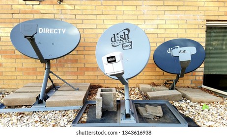 Aurora, Colorado - March 19, 2019: Satellite Dishes On The Ground