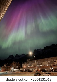 Aurora dancing over the mountains of Alberta.