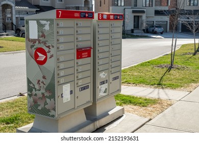 Aurora, Ontario, Canada - May 01 2020: A Canada Post Community Mailbox In Aurora, Ontario. Mail Carriers Drop Mail Off For All Houses In An Area Instead Of House To House.