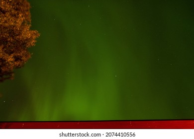 Aurora Photos. Ursa Major  Constellation Thorough Northern Light. 