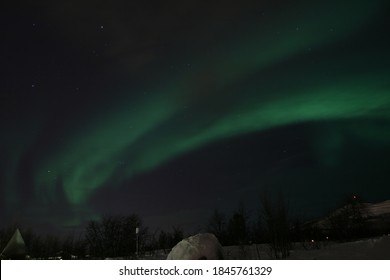 Aurora and stars in winter sky - Shutterstock ID 1845761329