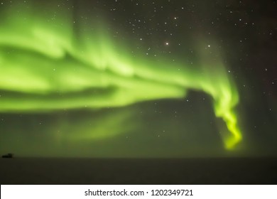 Auroras Over The Dark Sector At South Pole