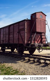 Auschwitz, Auschwitz/Poland - 04.20.2019: Abandoned Train Wagon In The Rail Entrance To Concentration Camp At Auschwitz Birkenau. Death Train Used To Transport Jews During The Holocaust To Auschwitz.