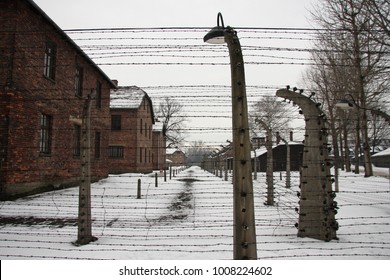 The Auschwitz Counter-camp (Poland, Krakow). The Liberation Of Auschwitz. Barracks For Prisoners Behind Barbed Wire. Winter.
