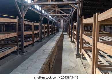 Auschwitz, Poland - 15 September, 2021: View Of The Interior Of One Of The Wooden Prisoner Barracks In The Auschwitz Concentration Camp In Poland