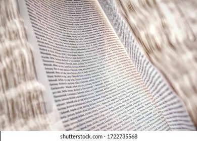 Auschwitz, Poland - November 29, 2019: Open Memory Book With The Names Of People Who Died During The Holocaust In The Concentration Labor Camp And The Auschwitz Death Camp In Poland. Nazi Terror In Eu