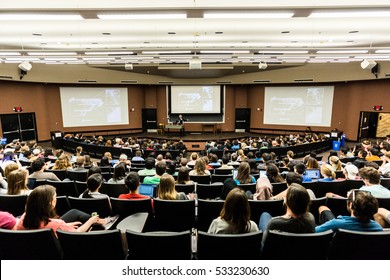 AUSTIN - CIRCA APRIL 2016: Professor Neil Shubin delivers a lecture to a large audience of college students at the University of Texas at Austin.
