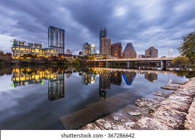 Austin Downtown Skyline By The River At Night, Texas.