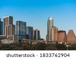 Austin dowtown buildings with blue sky and trees