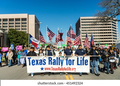 AUSTIN - JANUARY 23, 2016: Anti-abortion protesters march around the Texas capitol.