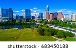 Austin Texas Auditorium Shores park during summertime sunny day skyline cityscape capital city downtown view from aerial drone near 1st street bridge