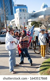 AUSTIN, TEXAS - JANUARY 19, 2020:  Counter-protest Demonstration And Presidential Motorcade Outside The Convention Center As President Trump Spoke To Texas Farmers At American Farm Bureau Federation.