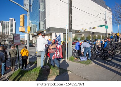 AUSTIN, TEXAS - JANUARY 19, 2020:  Counter-protest Demonstration And Presidential Motorcade Outside The Convention Center As President Trump Spoke To Texas Farmers At American Farm Bureau Federation.