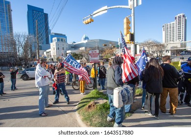 AUSTIN, TEXAS - JANUARY 19, 2020:  Counter-protest Demonstration And Presidential Motorcade Outside The Convention Center As President Trump Spoke To Texas Farmers At American Farm Bureau Federation.