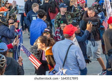 AUSTIN, TEXAS - JANUARY 19, 2020:  Counter-protest Demonstration And Presidential Motorcade Outside The Convention Center As President Trump Spoke To Texas Farmers At American Farm Bureau Federation.