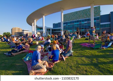 AUSTIN, TEXAS - JUNE 1 2014: The Long Center Lawn Is The Perfect Place To Sit Or Lounge D;uring An Outdoor Concert