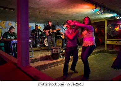 Austin, Texas - June 13, 2014: Country Music Band Playing And People Dancing In The Broken Spoke Dance Hall In Austin, Texas, USA