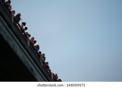 Austin, Texas - March 16, 2019: People Watching The Bats Fly Under The Congress Avenue Bridge 