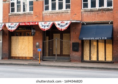 Austin, Texas March 19 2020: Businesses Closed Due To The COVID-19 Outbreak Are Seen Boarded Up Along 6th Street After The Mayor Steve Adler Ordered All Restaurants And Bars To Close