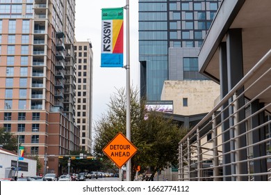 Austin, Texas March 3 2020: SXSW 2020 Sign With Detour Road Sign Underneath Just Before The Festival Is Set To Begin