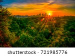 Austin Texas nature trail hiking at sunrise with golden hour sunburst glowing over the city skyline cityscape amazing fine arts photography