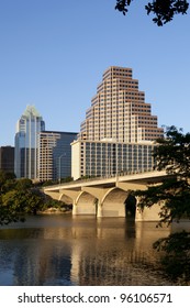 Austin, Texas skyline, Lady Bird Lake and Congress Avenue Bridge. This barrel-arched bridge with its open construction was built in 1910 and is an Austin landmark.