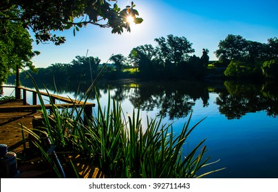 Austin texas travis lake LBJ reflections mirror image on the water during sunrise 