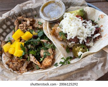 Austin, Texas USA - 04.16.2021:  Delicious Chicken And Brisket Taco At Torchy's Tacos Tex Mex Restaurant In Austin, TX. 