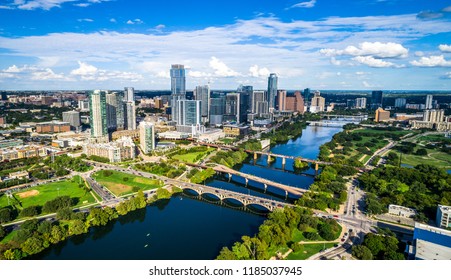 Austin , Texas , USA 2018 Finished Skyline No Cranes aerial drone view on perfect sunny partly cloudy summer afternoon town lake and bridges crossing Colorado river