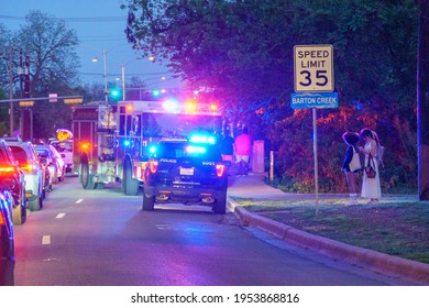 Austin, Texas, USA. April 10, 2021. A Police Car And A Fire Truck Responding To An Incident On Barton Springs Road In Austin Texas Creating Traffic Congestion. 