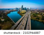 Austin Texas USA a gorgeous capital City of Texas aerial drone views above Coloradp River and Interstate 35 and tall skyscrapers growing Cityscape 