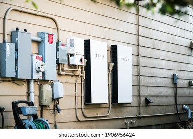 Austin , Texas , USA - January 26th 2020: Tesla Powerwall Home Battery Storage Connecting Home Energy Storage With Solar Panels And Powering The Grid With A Self Sustaining Future