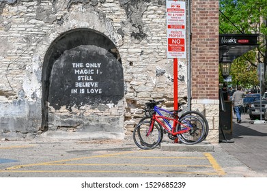 AUSTIN, TEXAS, USA - MARCH 17, 2019: Graffiti On An Old Wall In Downtown Austin, Tx During SXSW Festival In March 2019. Austin Is The Capital City Of Texas.