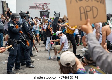 Austin, Texas / USA - May 30, 2020: Protesters Demonstrating Against Police Brutality Overtake Interstate 35 In Downtown Austin, TX. 