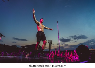 AUSTIN, TX / USA - August 2nd, 2018: Dan Reynolds Of Imagine Dragons Performs Onstage At Austin360 Amphitheater.