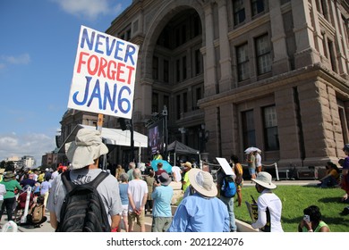 Austin, TX, USA - July 31, 2021:   Demonstrators at a rally at the Capitol protest voting rights limitations contained in bills written by Republicans in the state legislature .