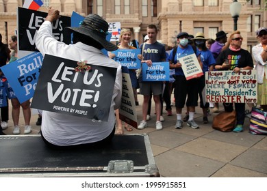 Austin, TX, USA - June 20, 2021:  Demonstrators gather outside  the Capitol to protest Texas SB 7, a bill that would place new restrictions on access to the polls.