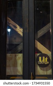 Austin, TX / USA - March 17 2020: The Entrance To Lit Lounge Bar Downtown Is Closed And Blocked During The Coronavirus Pandemic.