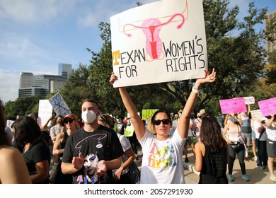 Austin, TX, USA - Oct. 2, 2021: A couple at the Women's March rally at the Capitol protests SB 8, Texas' abortion law that effectively bans abortions after six weeks of pregnancy.