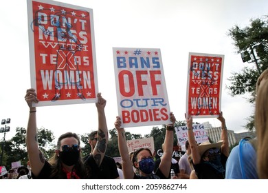 Austin, TX, USA - Oct. 2, 2021:  Participants at the Women's March rally at the Capitol protest SB 8, Texas' abortion law that effectively bans abortions after six weeks of pregnancy.