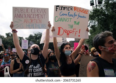 Austin, TX, USA - Oct. 2, 2021:  Two Women Participants At The Women's March Rally At The Capitol Protest SB 8, Texas' Abortion Law That Effectively Bans Abortions After Six Weeks Of Pregnancy.