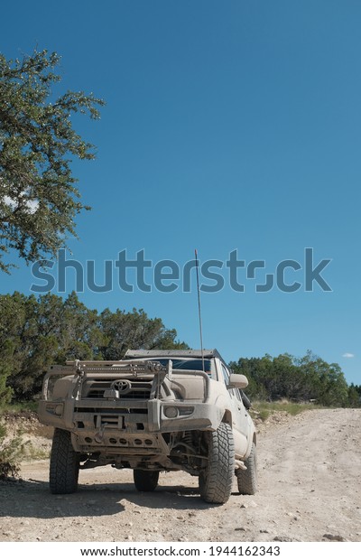 AUSTIN, UNITED STATES - Jun 19, 2019: Photos of a\
off-road Toyota truck covered in mud  Pictures taken at Hidden\
Falls, Austin, TX 