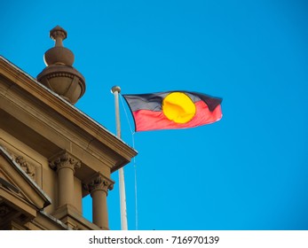 Australia Aboriginal Flag Flying On Sydney Townhall Building.