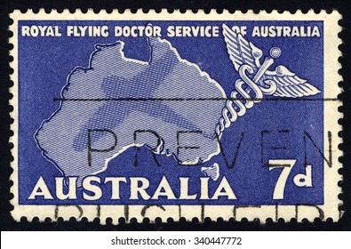 AUSTRALIA - CIRCA 1957: A Stamp Printed By Australia Dedicated To Royal Flying Doctor Service Of Australia Shows The Caduceus And Map Of Australia, Circa 1957