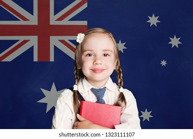 Australia Concept With Little Girl Student With Book On The Australian Flag Background