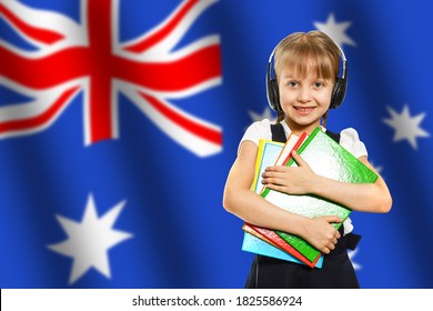 Australia Concept With Little Girl Student With Book On The Australian Flag Background