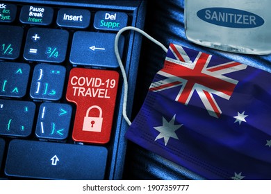 Australia COVID-19 Coronavirus Travel Restrictions Concept Showing Red Button Warning On Keyboard With Australian Flag Face Mask And Hand Sanitizer. New Normal In Global Travel.